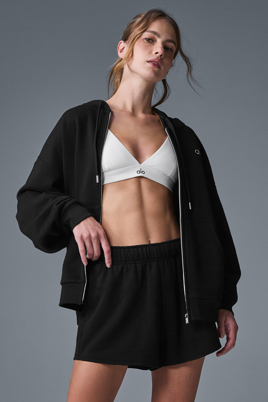 Side view of the oversized hoodie for men, highlighting the relaxed fit and full zip feature.