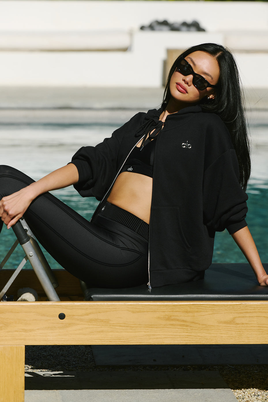 Front view of the Accolade oversized zip up hoodie in black, showcasing its stylish design.