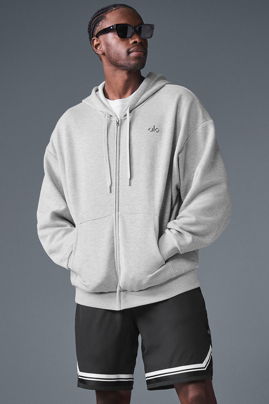 Front view of the Accolade zip up hoodie in athletic heather grey.