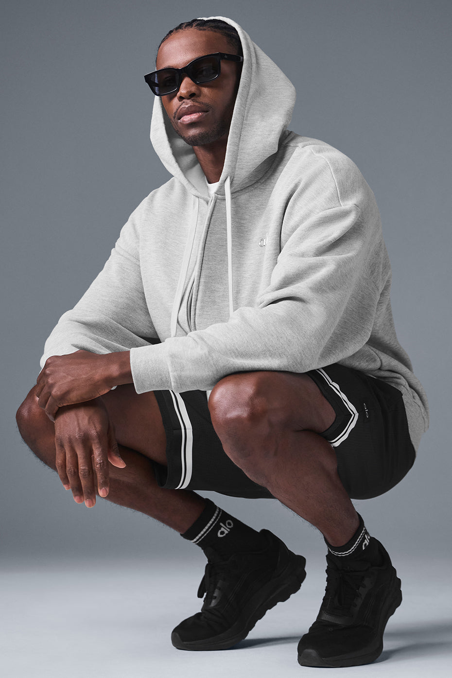 Front view of the Accolade zip up hoodie in athletic heather grey.