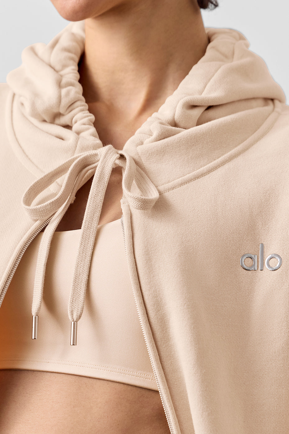 Front view of macadamia oversized zip up hoodie