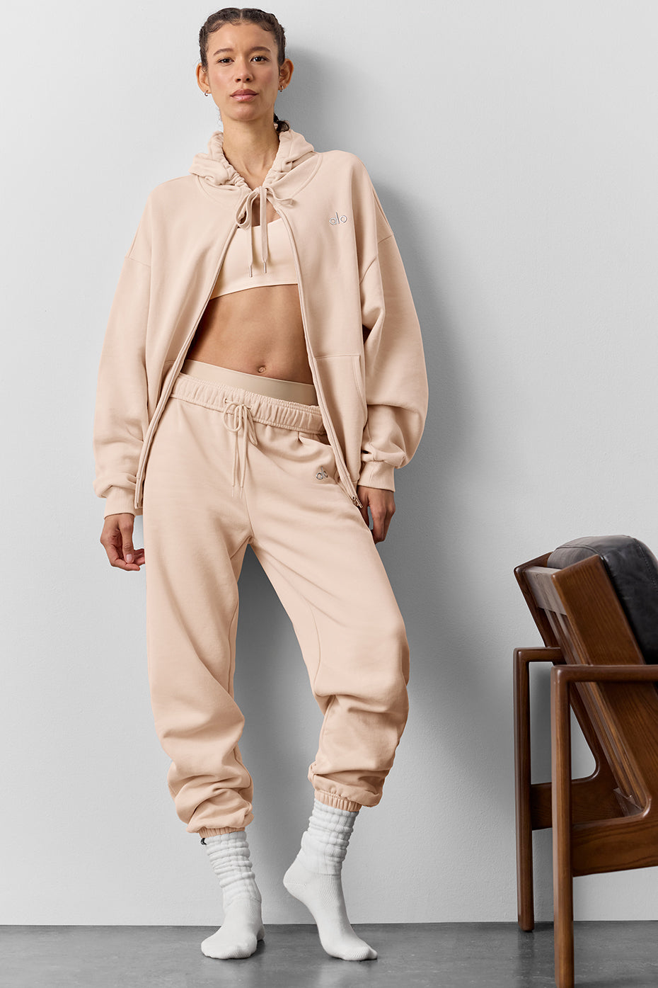 Casual styling of black zip up hoodie with oversized fit
