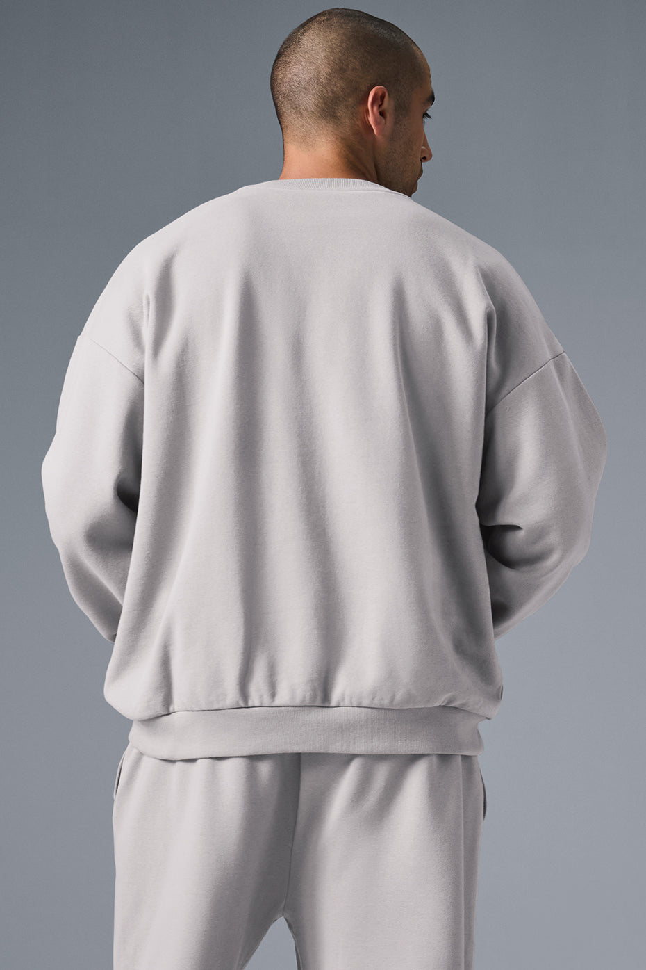 Front view of the Accolade crew neck pullover in Grey Sky Wash showcasing the relaxed fit and classic crewneck style