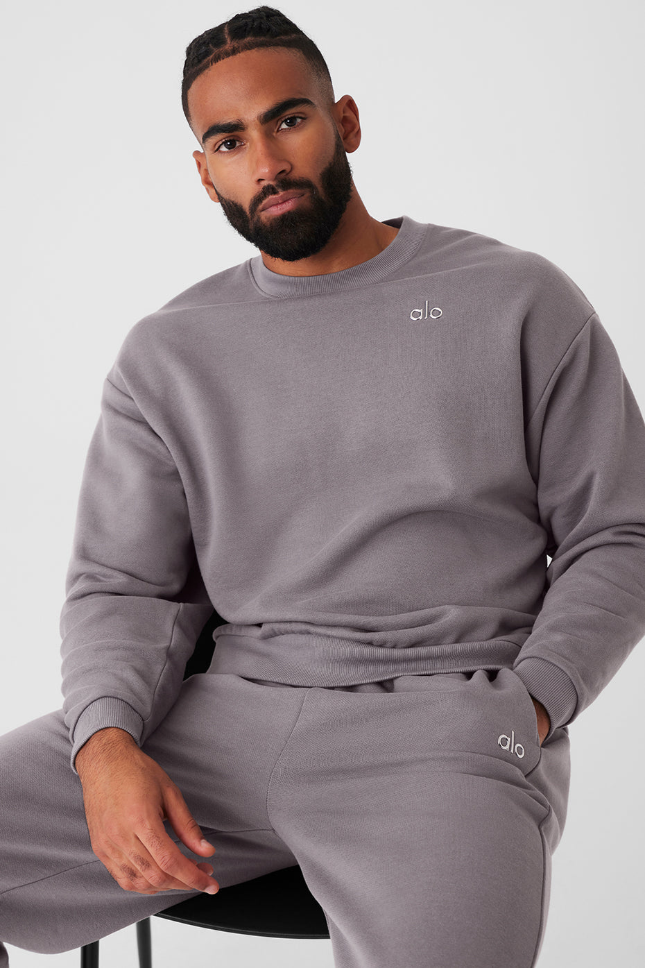 Front view of the Accolade crew neck pullover in cool grey, showcasing its relaxed fit.