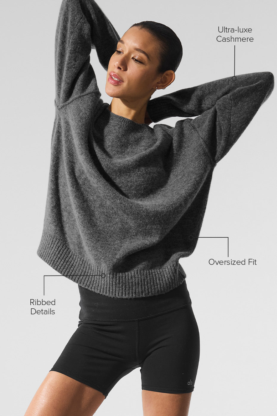 Relaxed fit of the platinum grey cashmere sweater shown from the side.