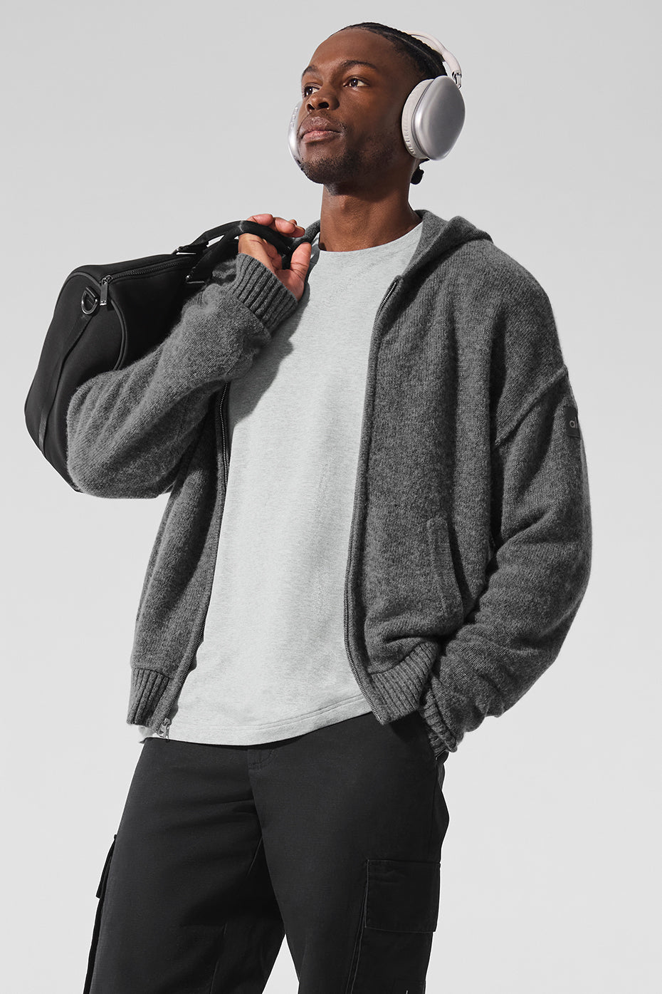 Platinum grey cashmere zip hoodie showcased outdoors for casual wear.