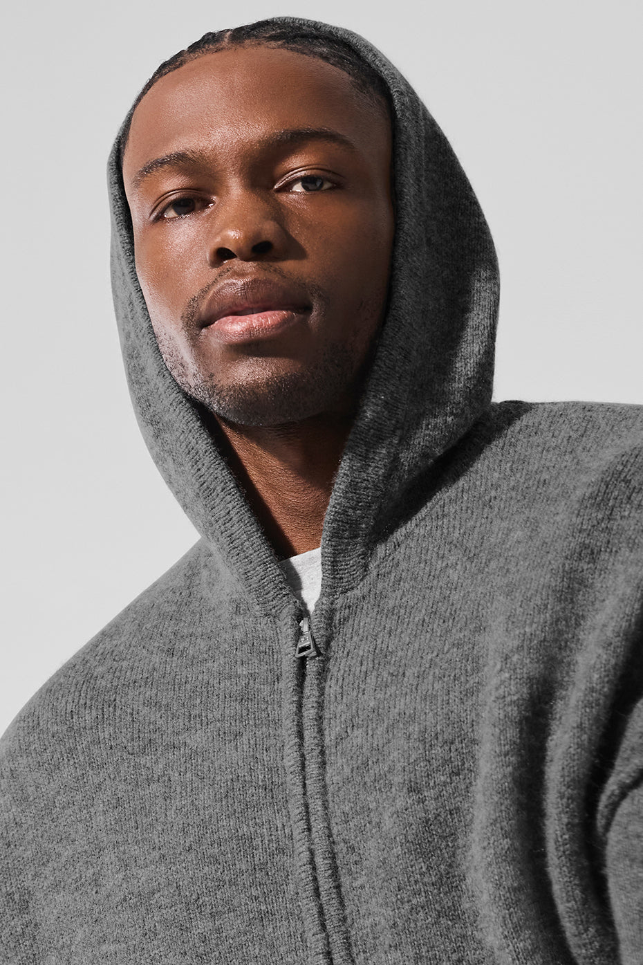 Detail view of the luxurious fabric of the cashmere hoodie.