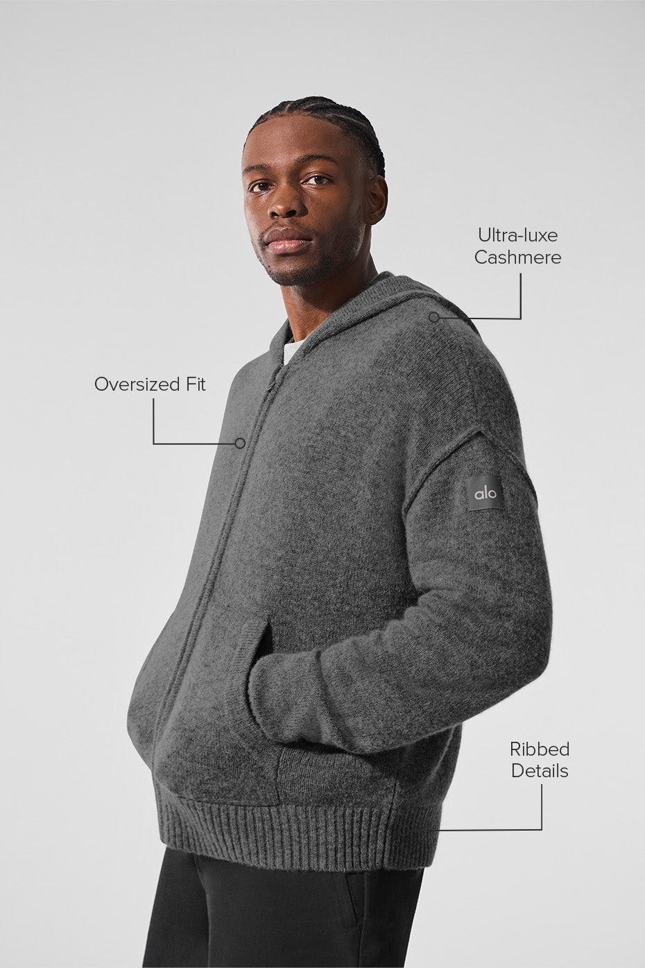 Detail view of the luxurious fabric of the cashmere hoodie.