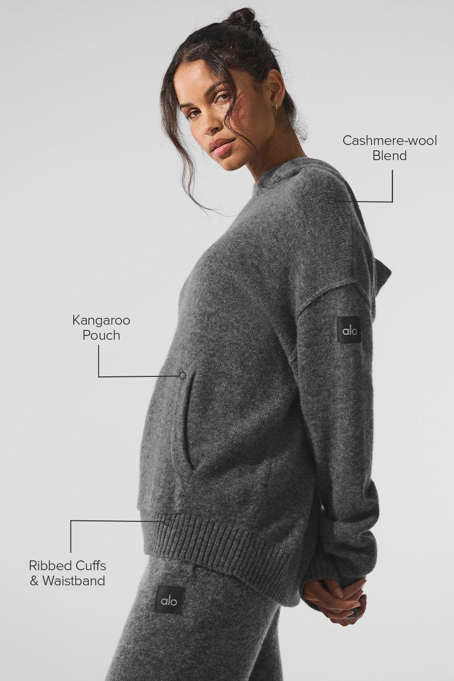 Front view of a cashmere zip hoodie with a sleek fit and soft texture