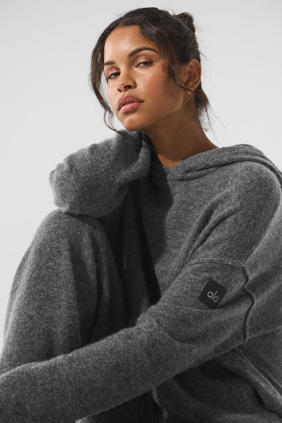 Casual styling with a ladies cashmere hoodie sweater paired with jeans