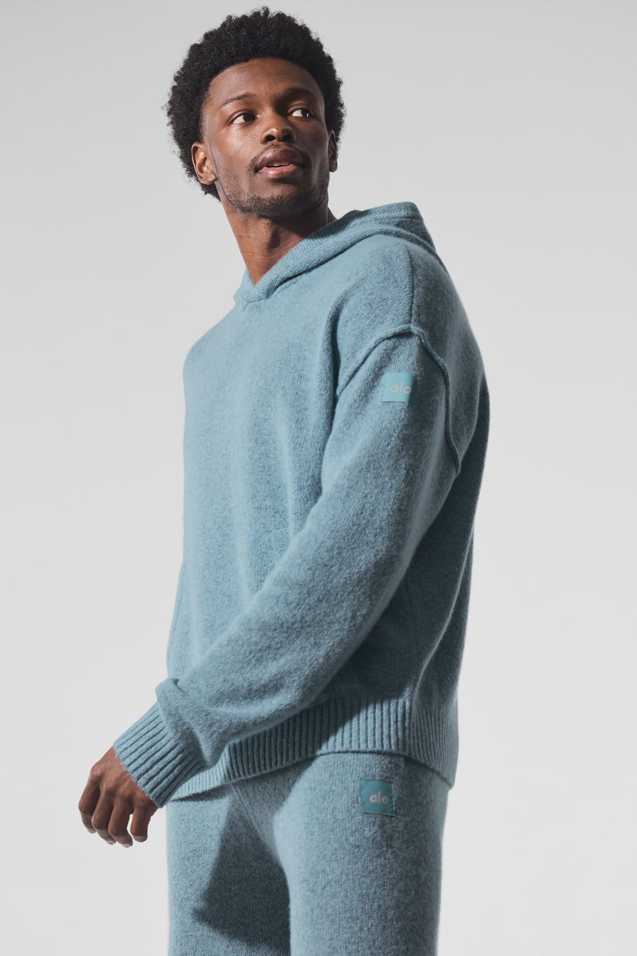 Front view of the ladies cashmere hoodie in celestial blue.