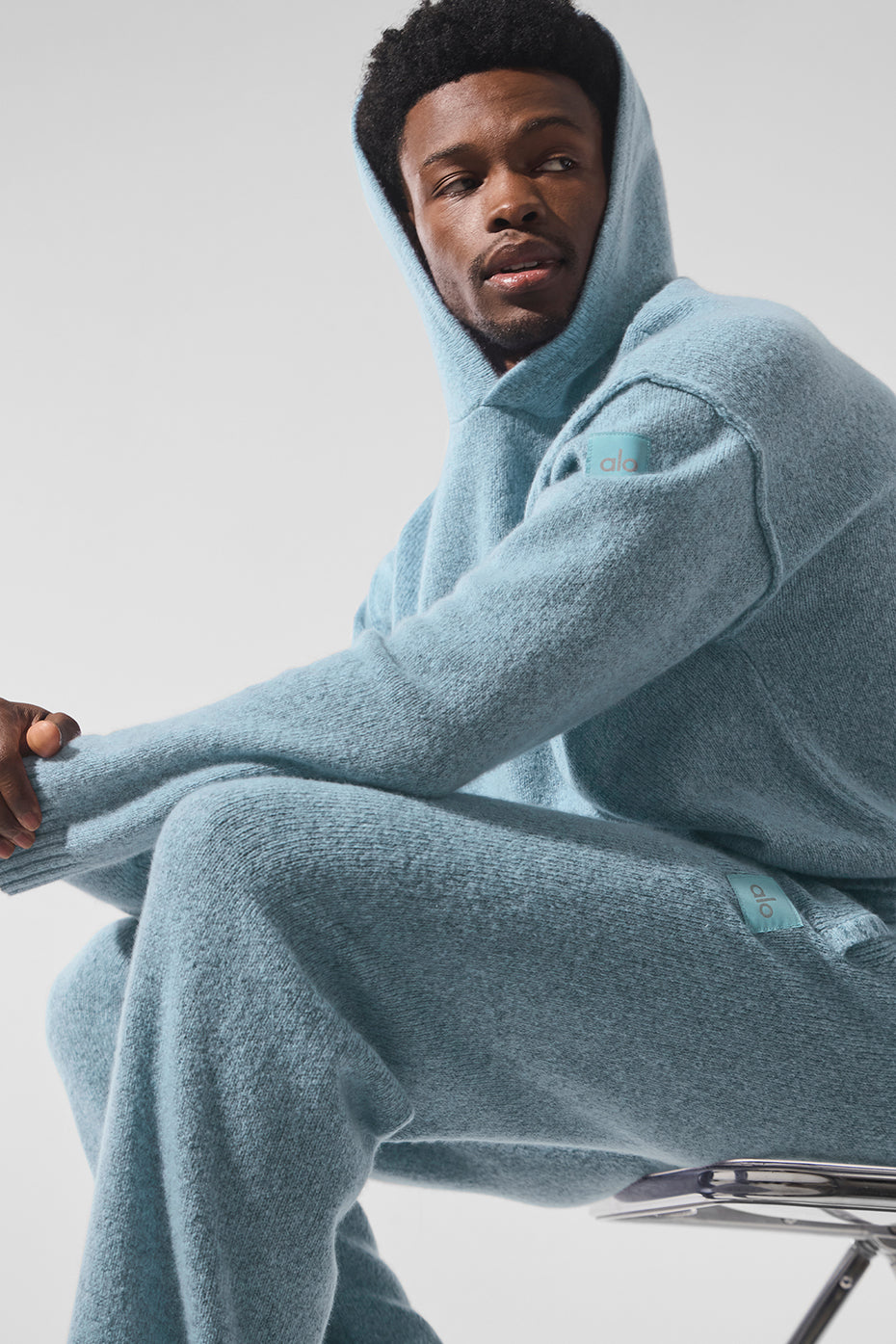 Front view of the ladies cashmere hoodie in celestial blue.