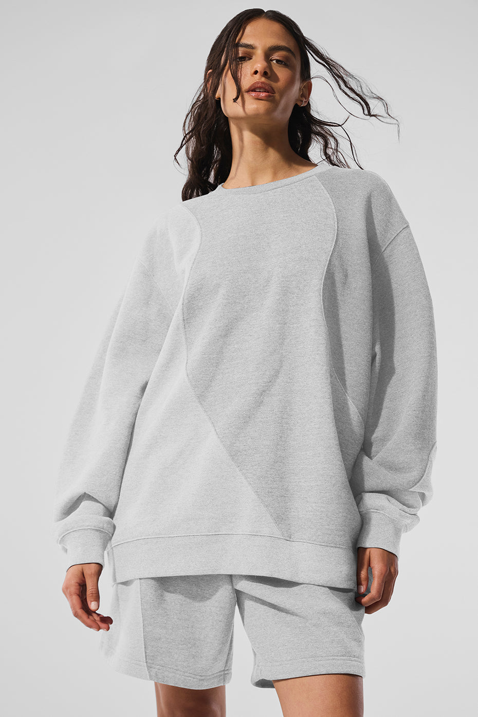 Front view of oversized sweater worn outdoors in Winter Springs park