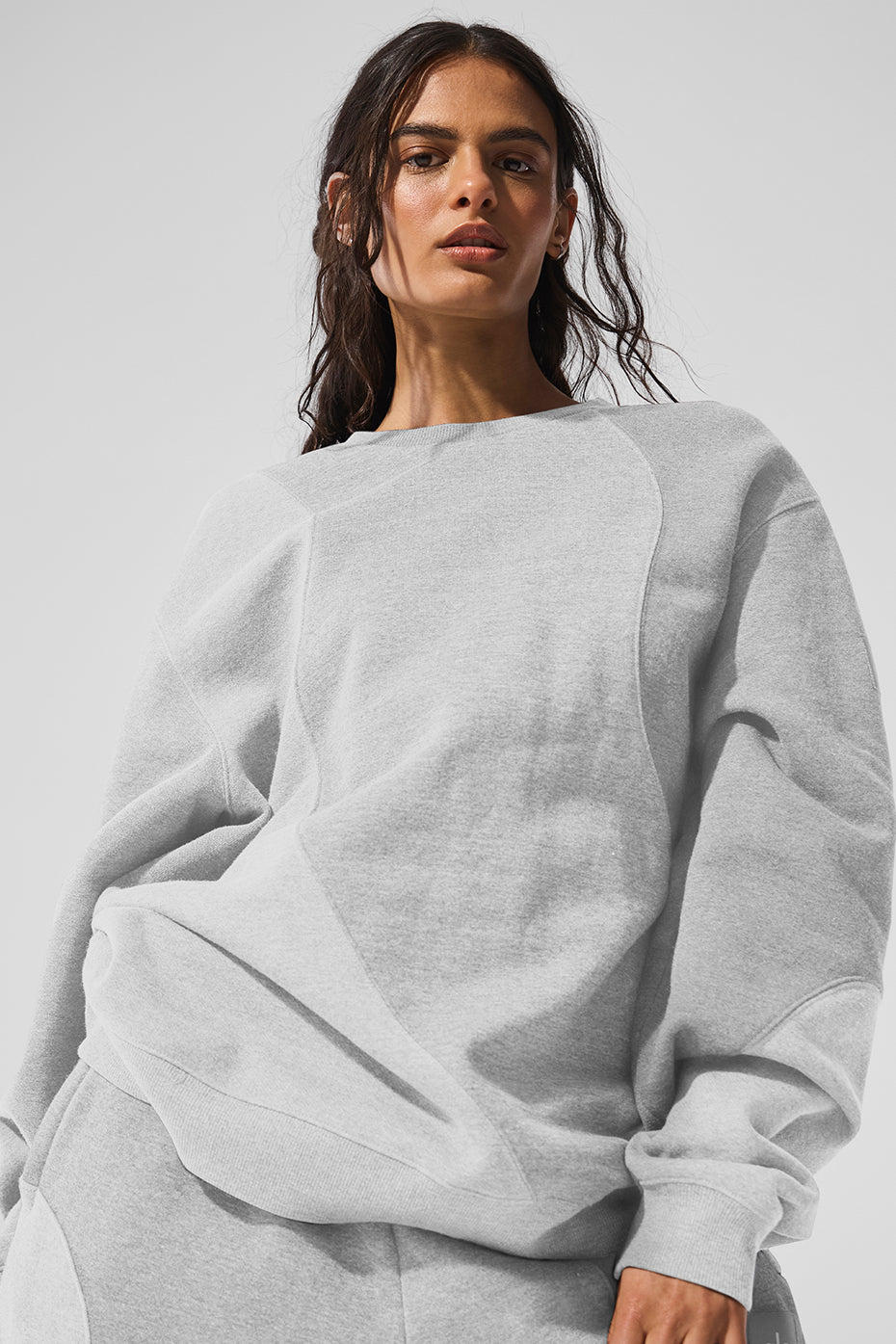 Front view of oversized sweater worn outdoors in Winter Springs park