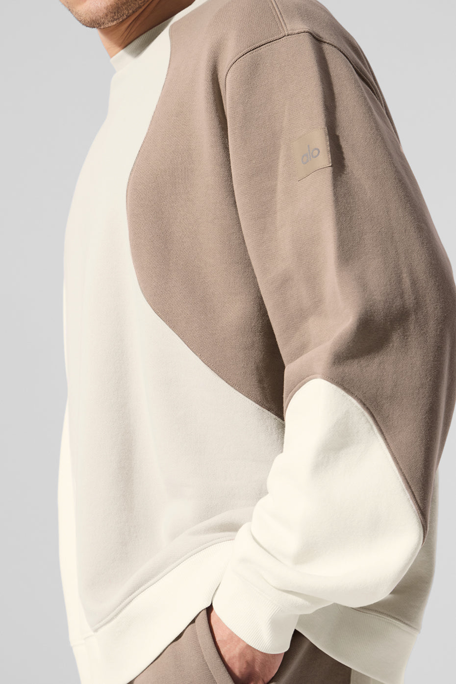 Make Waves sweatshirt folded neatly with the ivory/bone/gravel color palette visible.