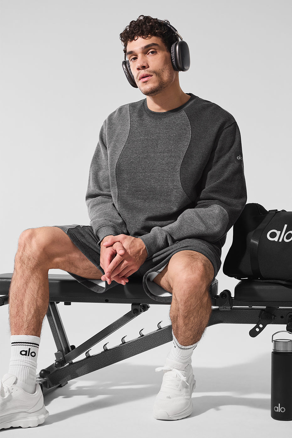 Front view of the Accolade crew neck pullover in dark heather grey.