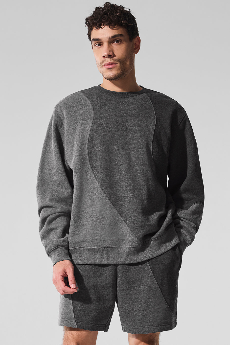 Front view of the Accolade crew neck pullover in dark heather grey.