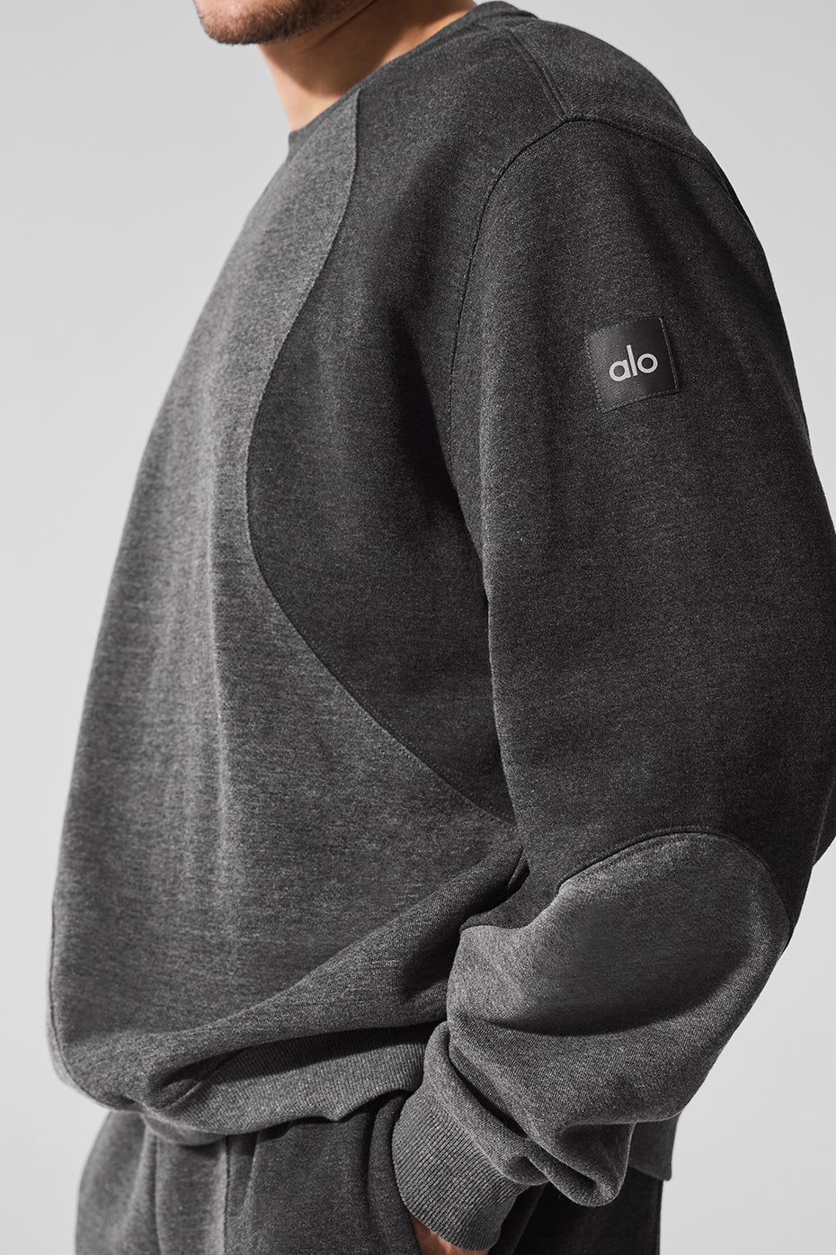 Close-up of the soft French terry fabric of the crew neck pullover.