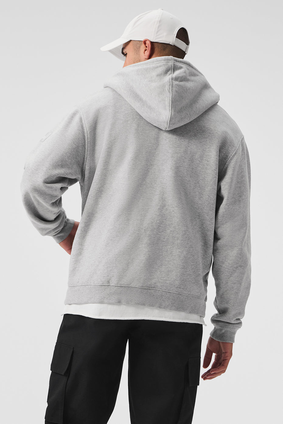Side view of the Renown Full Zip Hoodie, highlighting the dropped shoulders and kangaroo pocket.