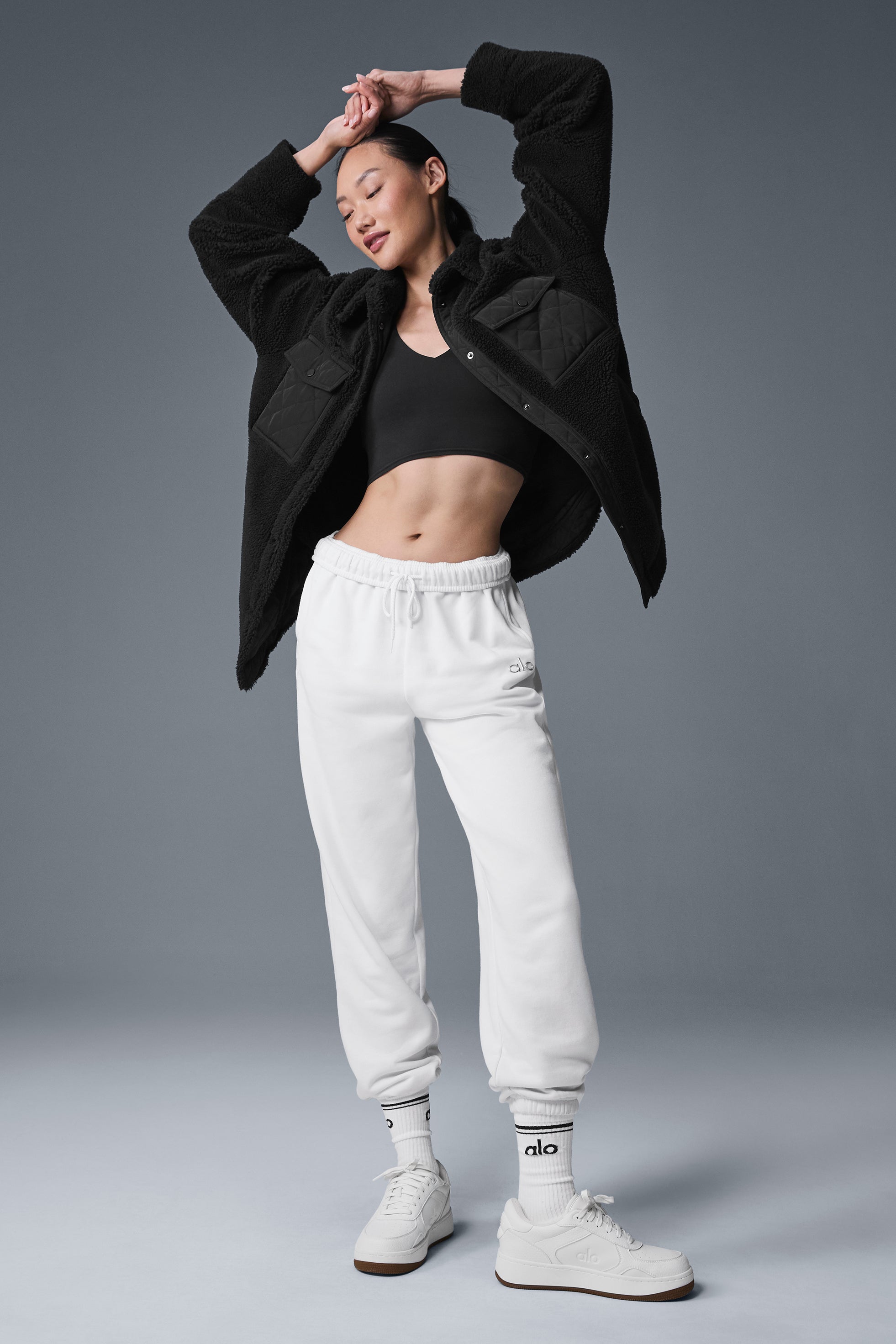 Front view of the cozy black shacket showcasing classic collar and cuffs