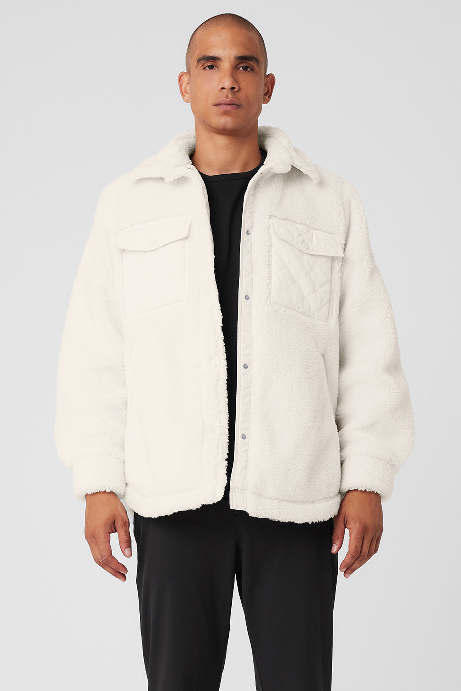 Front view of the ivory quilted sherpa shacket showcasing its stylish design.