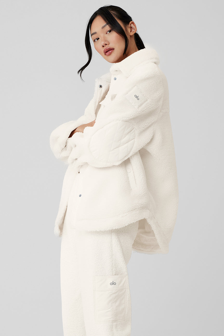 Jean jacket sherpa womens version layered over a turtleneck