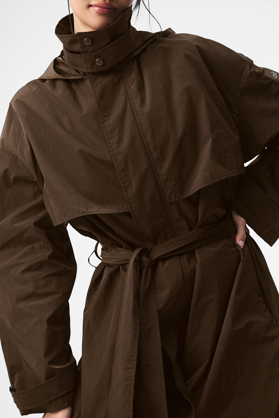 Detail shot of leather-like textured fabric and zippable collar.