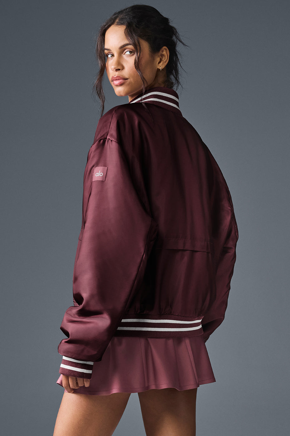 Close-up of the Burgundy Truffle varsity jacket showcasing its details.
