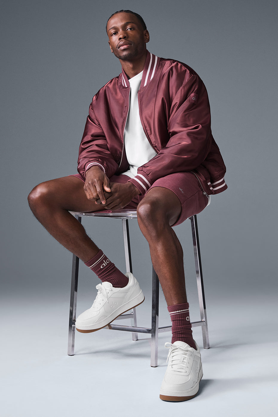 Side angle of the mens varsity jacket, perfect for layering in cooler weather.