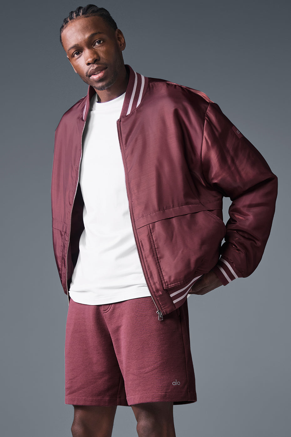 Front view of the burgundy varsity jacket showcasing its stylish design.