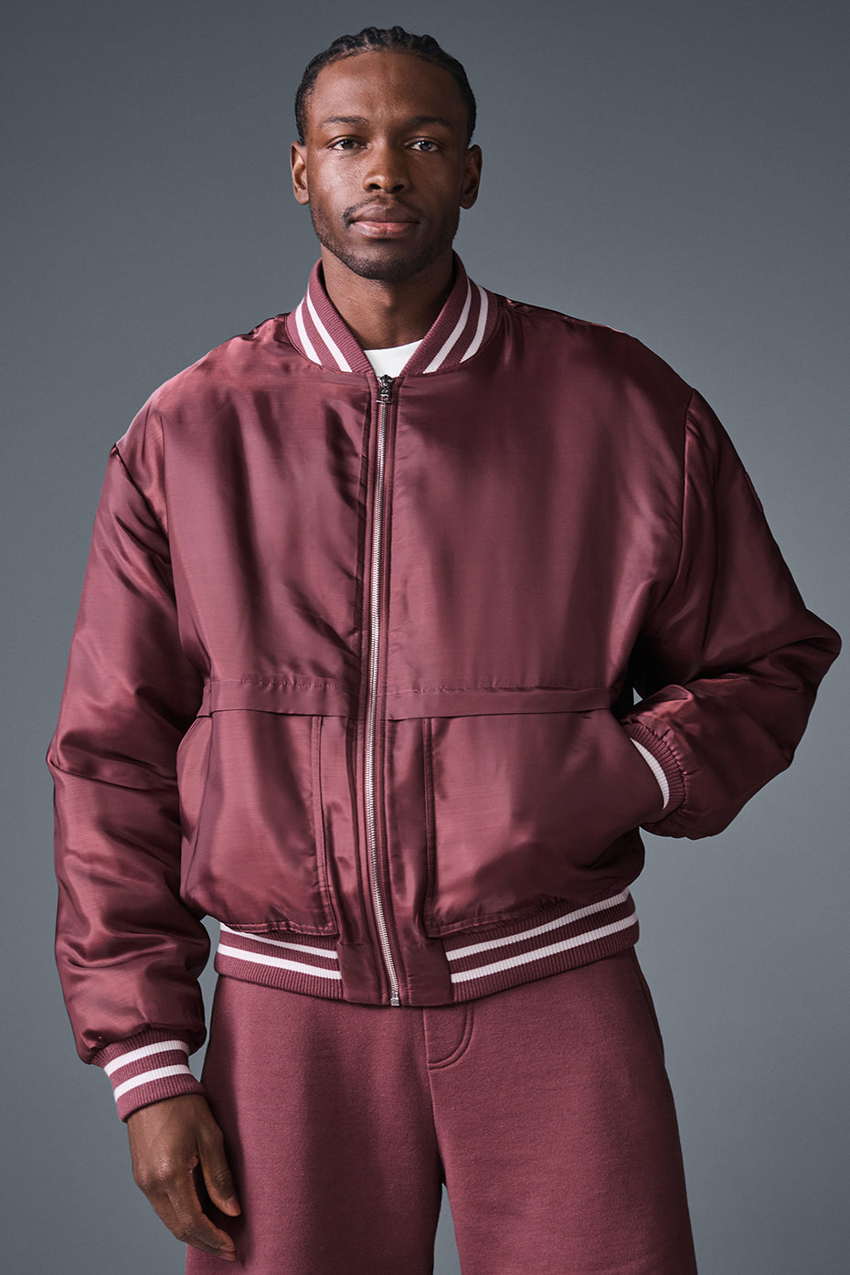 Front view of the burgundy varsity jacket showcasing its stylish design.