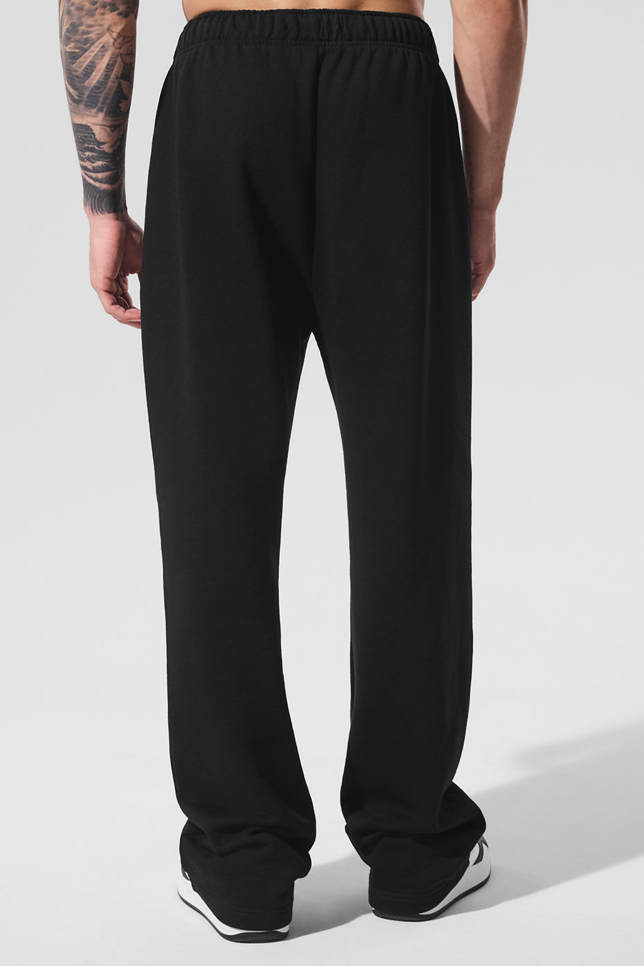 Side angle showing the tailored cut of these sweatpants for everyday wear
