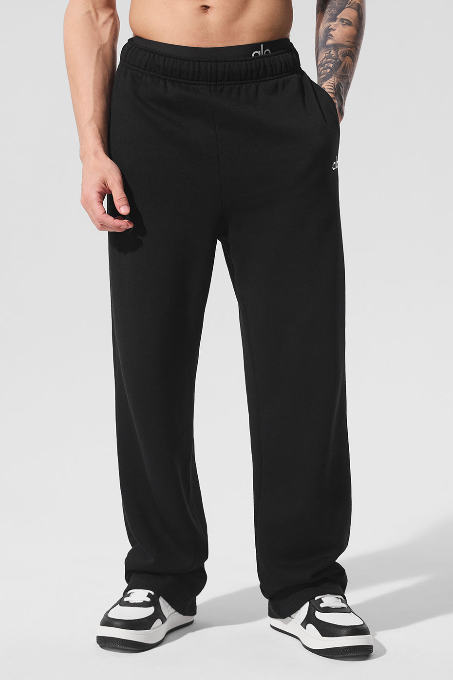 Side angle showing the tailored cut of these sweatpants for everyday wear