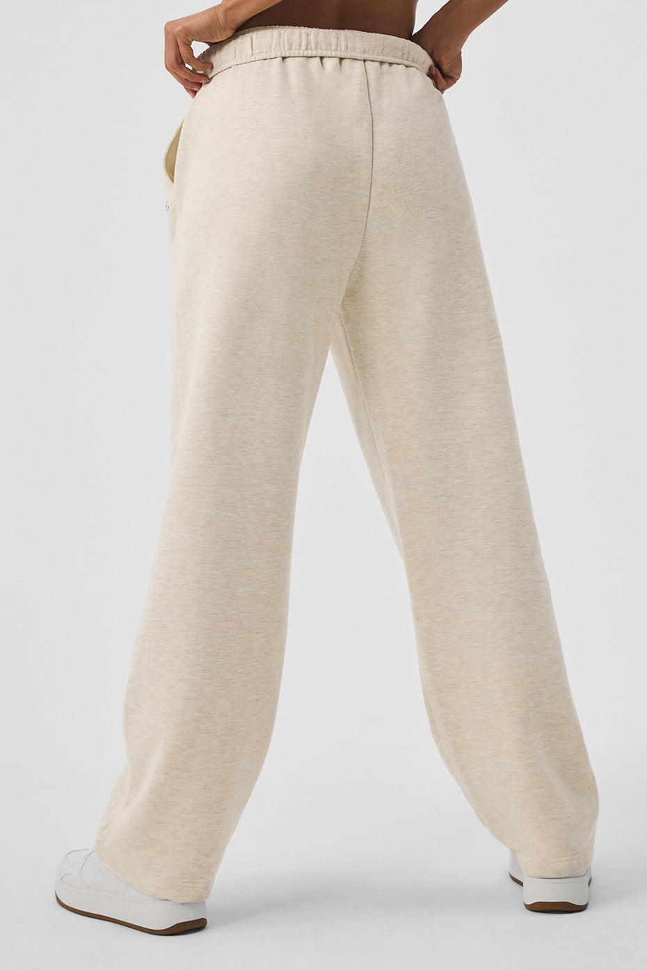 Side view showcasing the fit of the straight leg sweatpants.