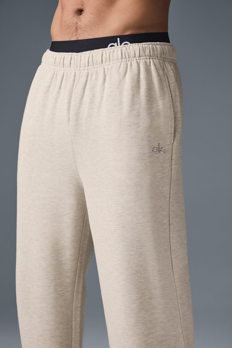 Model wearing Accolade athletic pants styled with a jacket.