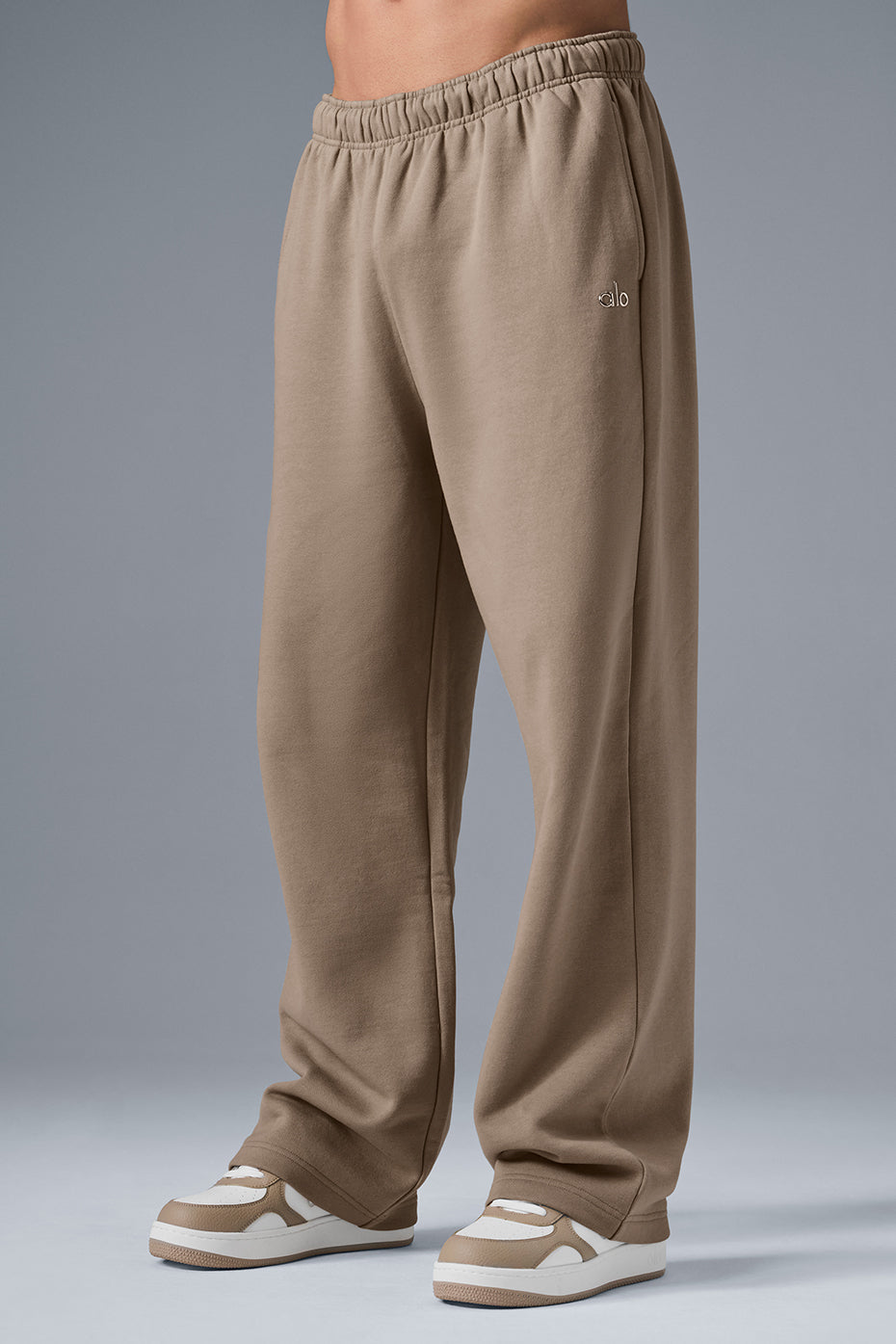 Side view of the Accolade sweatpants, highlighting the straight-leg design.