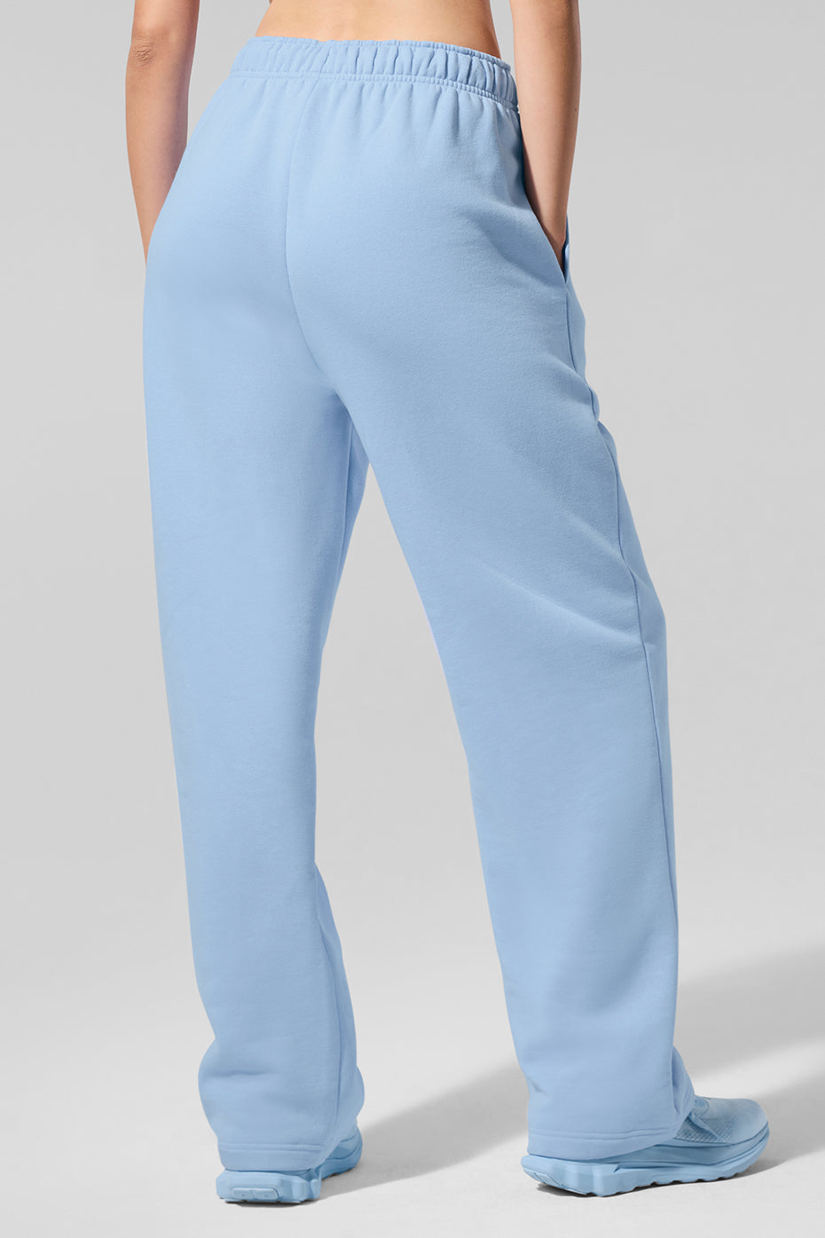 Model wearing Accolade wide leg sweatpants, demonstrating versatile styling options.