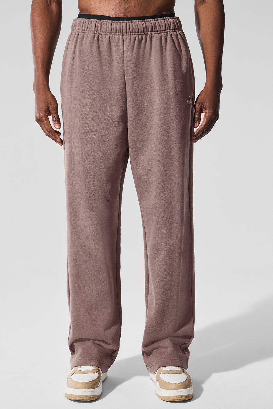 Front view of Accolade Luxe Straight Leg Sweatpants in Mushroom, showcasing the chrome logo.