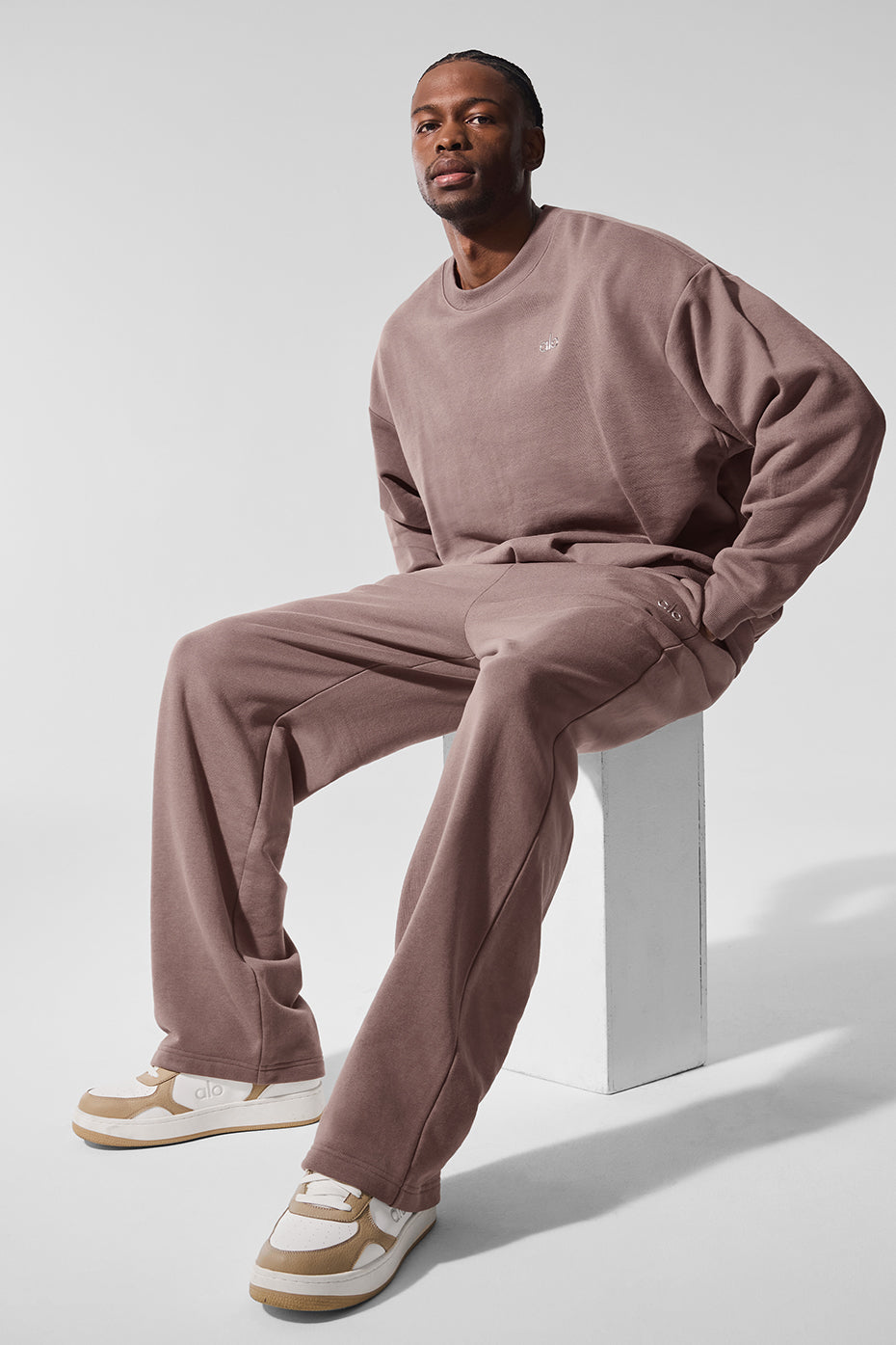 Front view of Accolade Luxe Straight Leg Sweatpants in Mushroom, showcasing the chrome logo.
