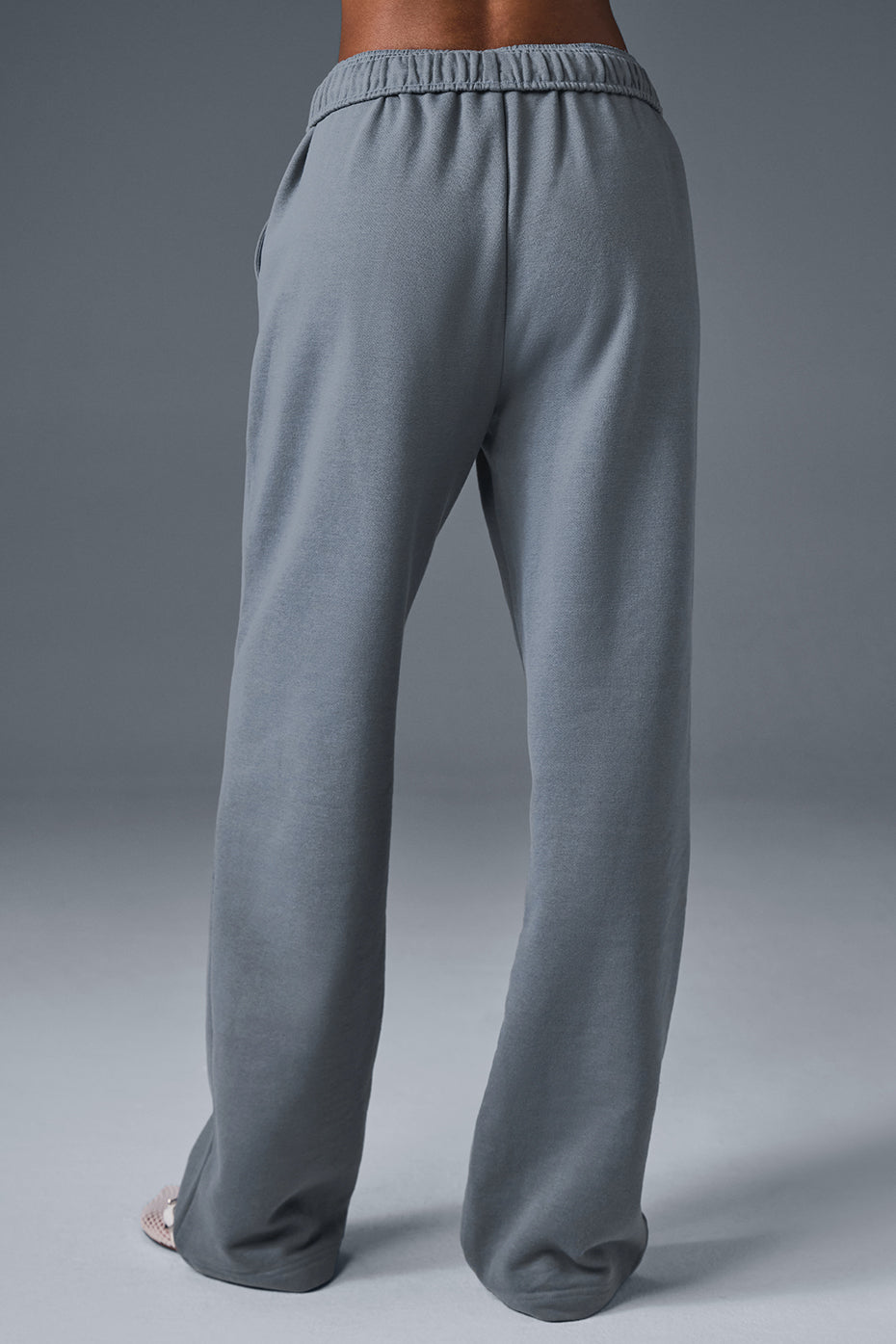 Side view of the Accolade sweatpants, highlighting the soft fabric and straight-leg design.