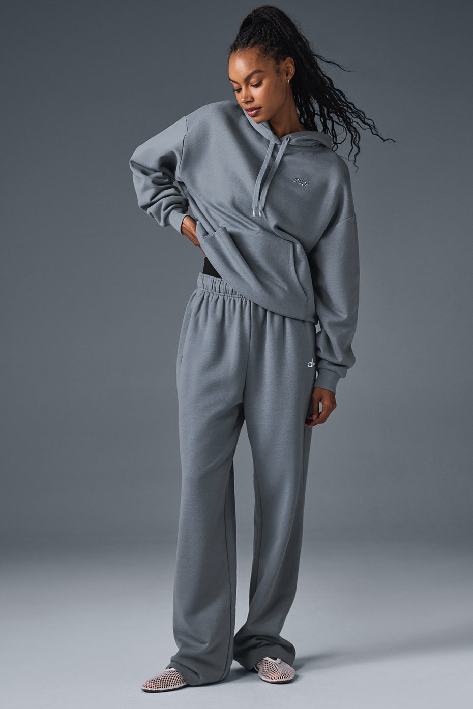Front view of Accolade straight-leg sweatpants in steel grey, showcasing the chrome ALO logo.