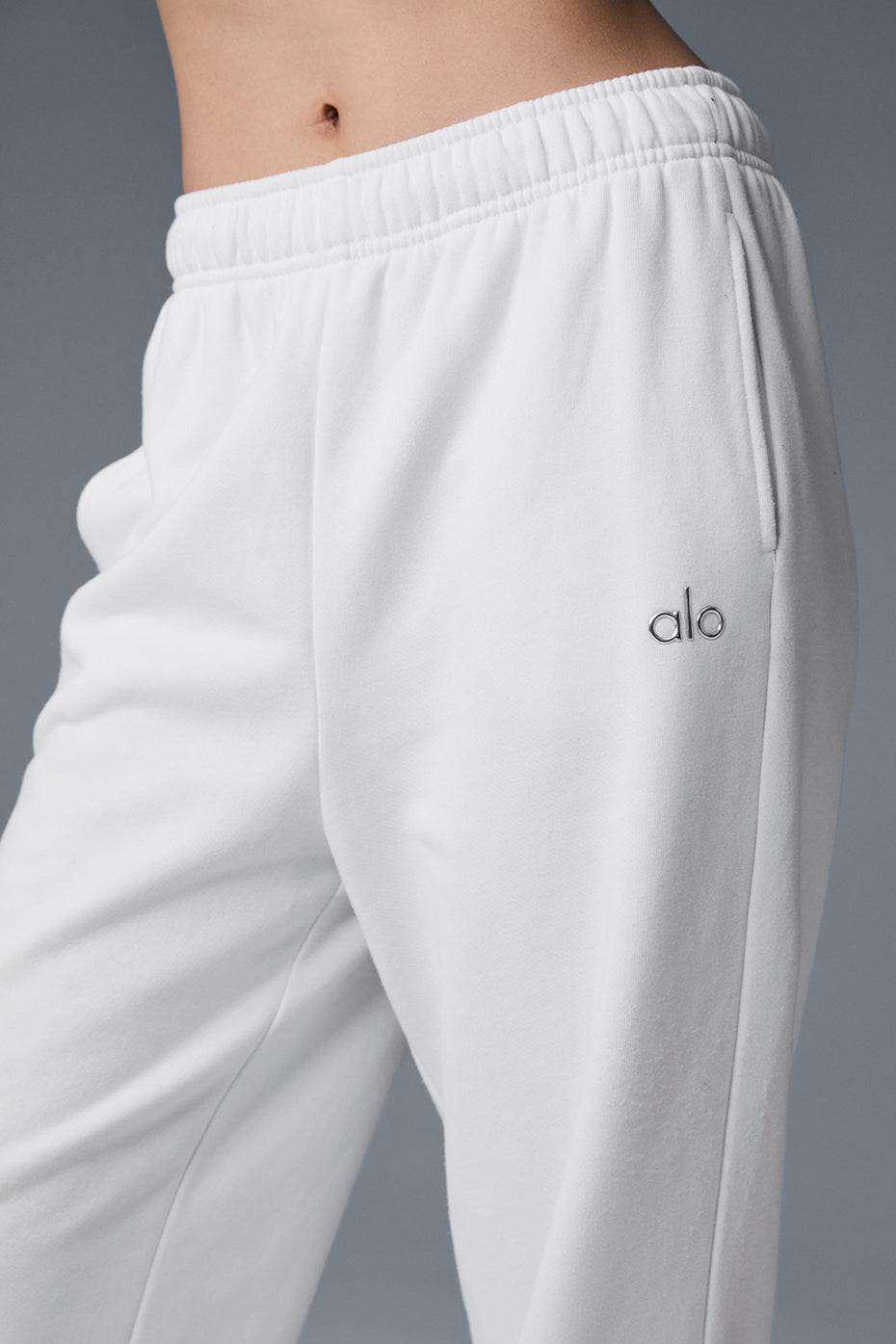 Front view of relaxed fit sweatpants showing elastic waistband and cuffs
