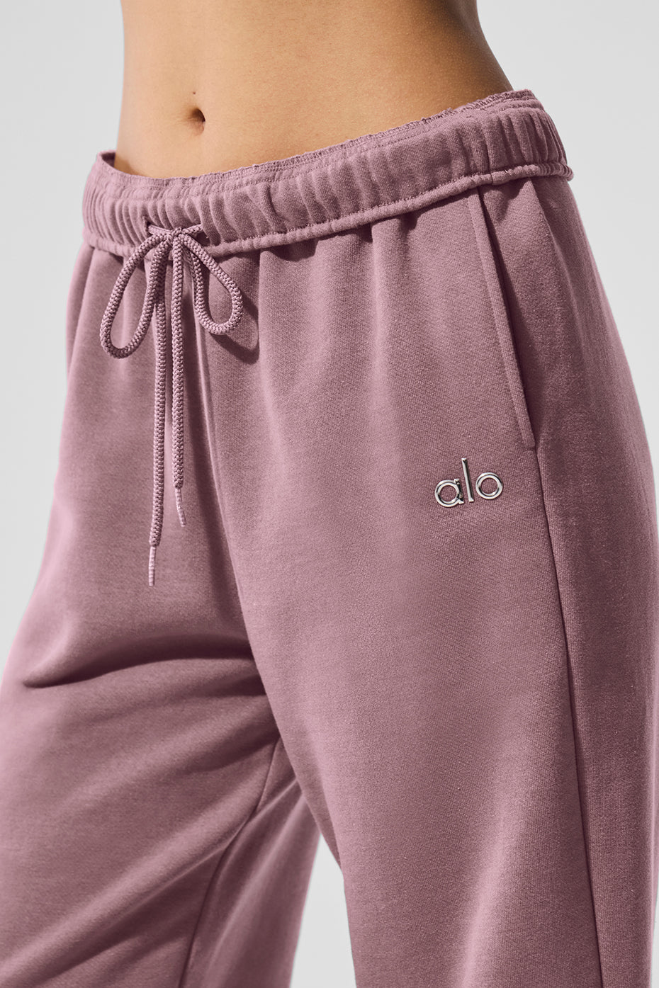 Camo sweatpants showcased outdoors for a casual look.