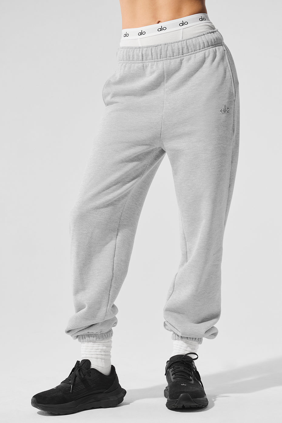 Front view of Accolade wide leg sweatpants in heather grey, styled with a matching hoodie.