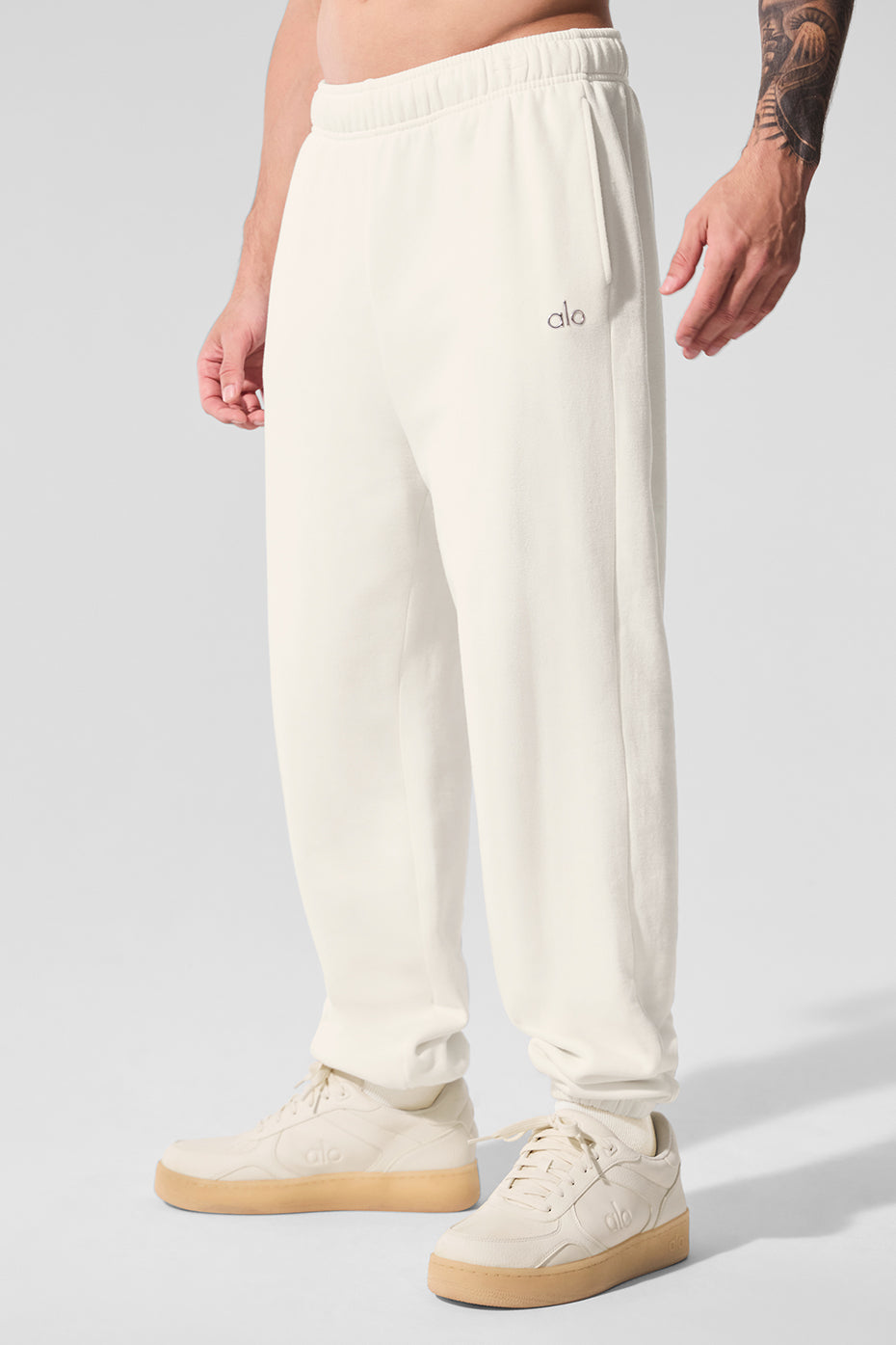 Close-up of French terry fabric texture on ivory sweatpants