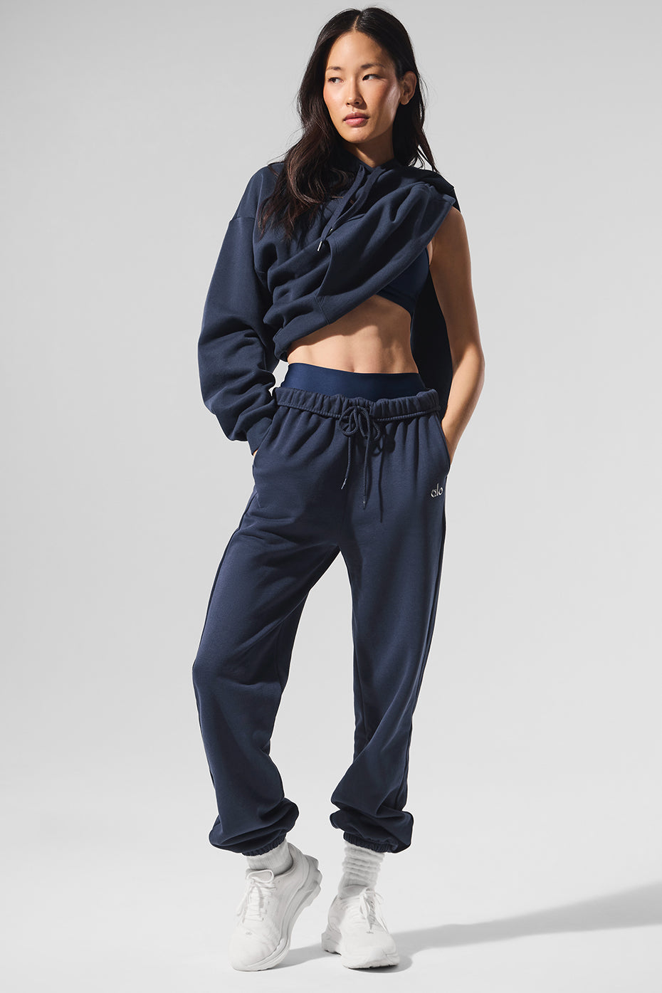 Close-up of the soft French terry fabric of navy blue sweatpants
