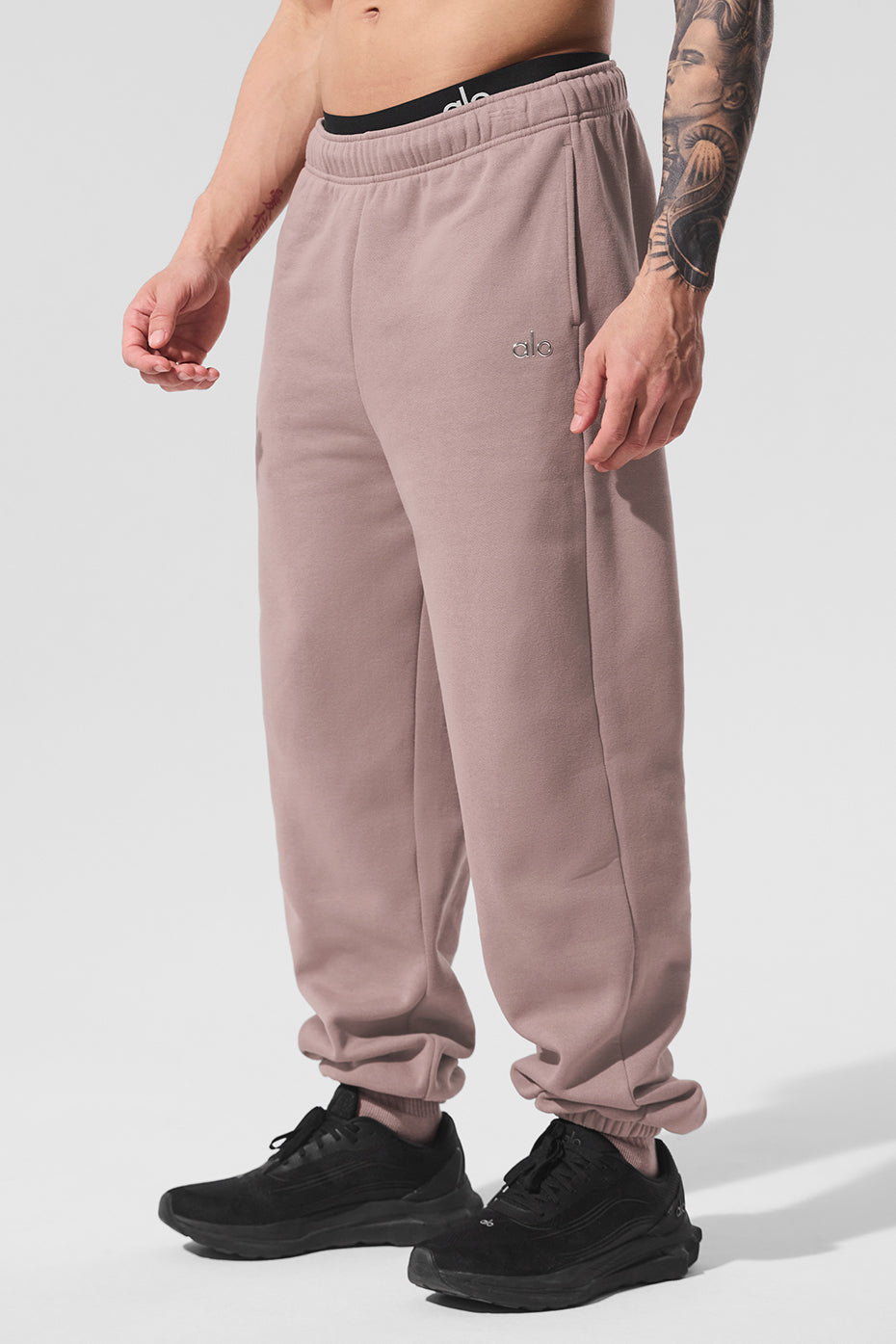 Front view of taupe lounge pants with elastic cuffs for daily errands
