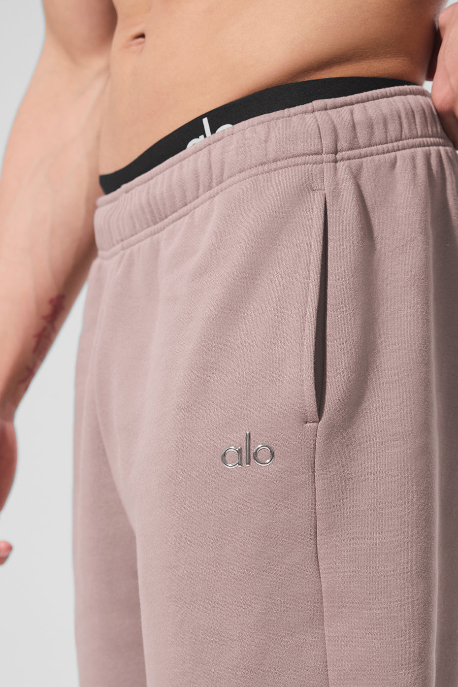 Side angle showing soft French terry texture on casual joggers