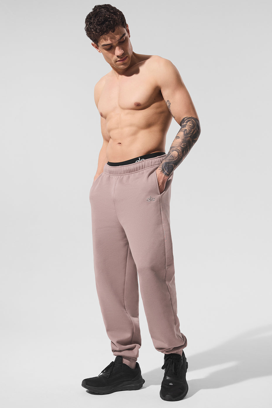 Front view of taupe lounge pants with elastic cuffs for daily errands
