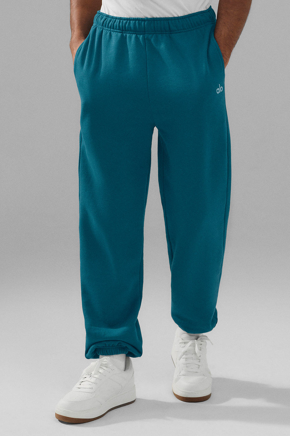 Front view of Oceanic Teal unisex sweatpants, showcasing relaxed fit.